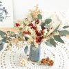 Bouquet de fleurs séchées or et rouge pour noël