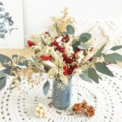 Bouquet de fleurs séchées or et rouge pour noël
