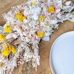 Centre de table en fleurs séchées pour mariés